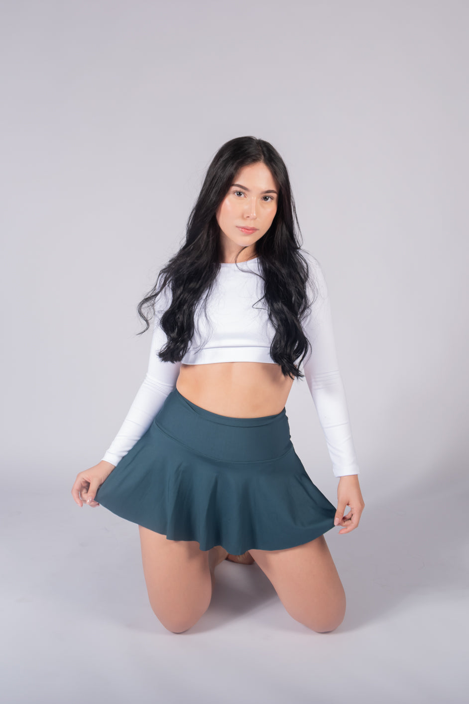 Falda Short Deportivo unicolor Justfit color Verde Azulado.